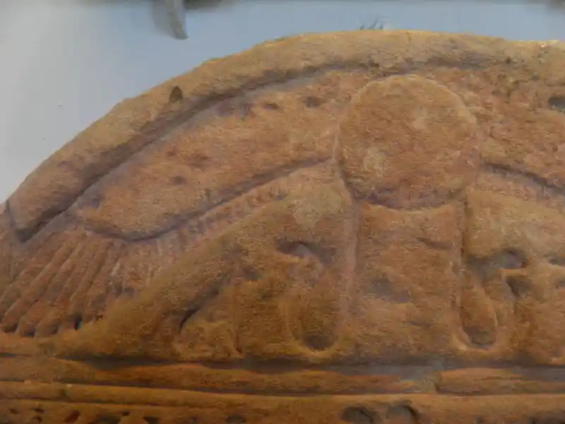 Winged solar disc on top of the stela of Domitian